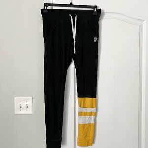 PINK | yellow and black yoga leggings - L